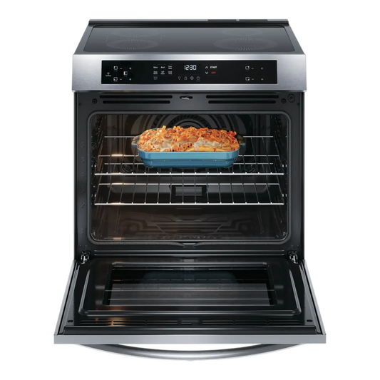 Noboxy Frigidaire Gallery 30-inch stainless steel induction range with oven door open and pasta dish inside